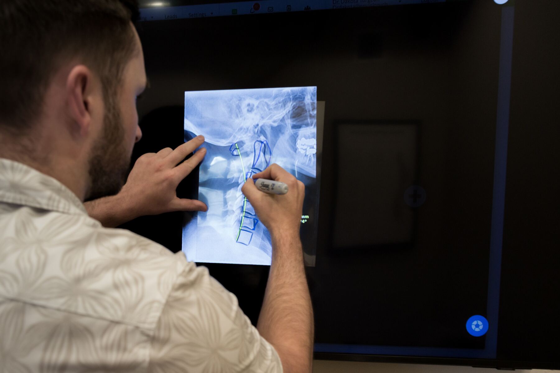Reviewing spinal imaging to identify a disc problem