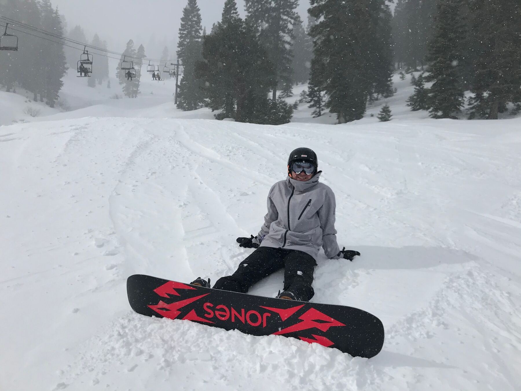 Dr. Dakota snowboarding on a powder day