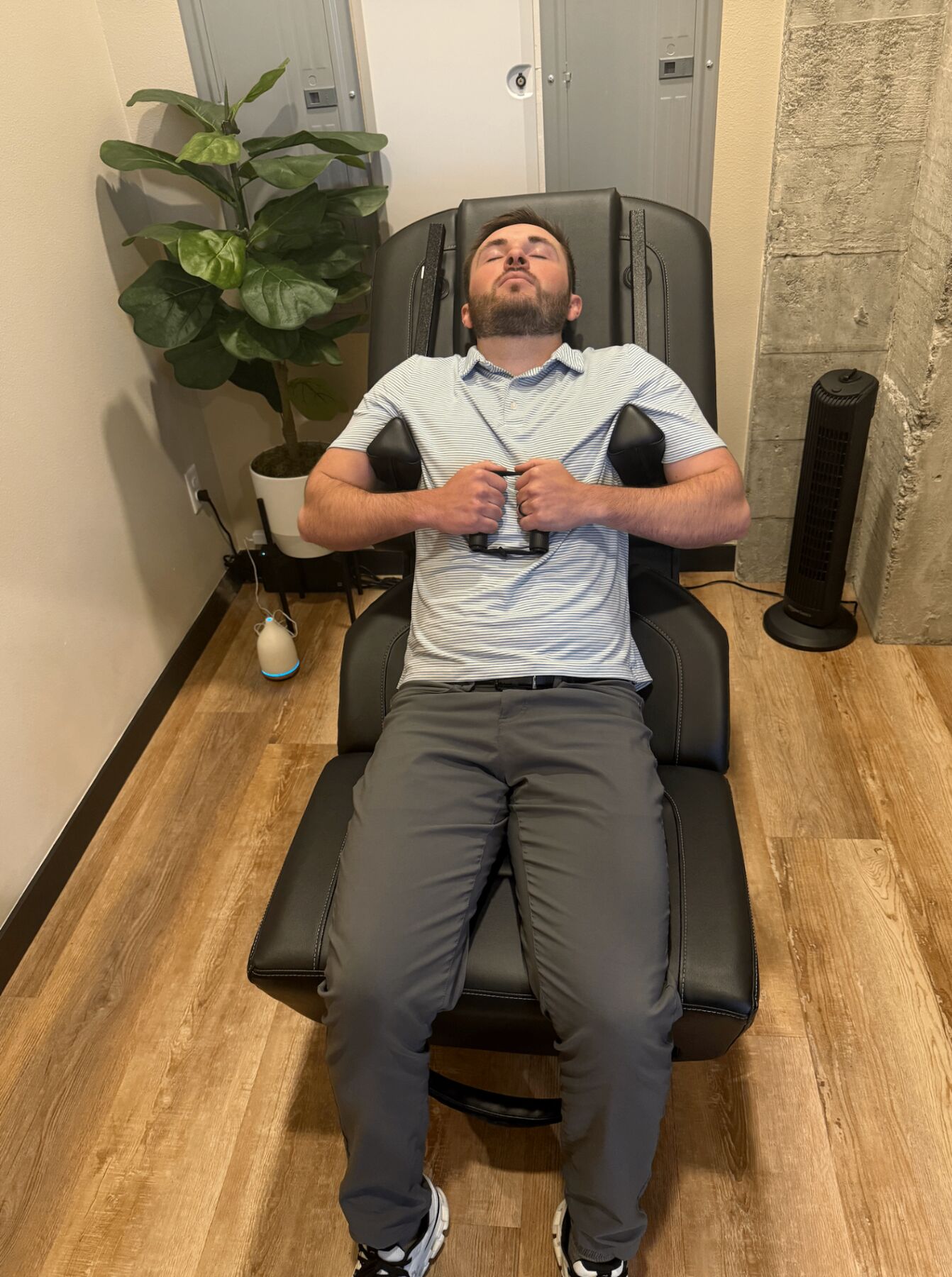 Patient relaxing in the spinal decompression chair at Envision Chiropractic in Bellingham, WA